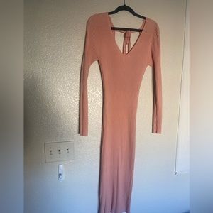 Super cute, fitted peach dress.